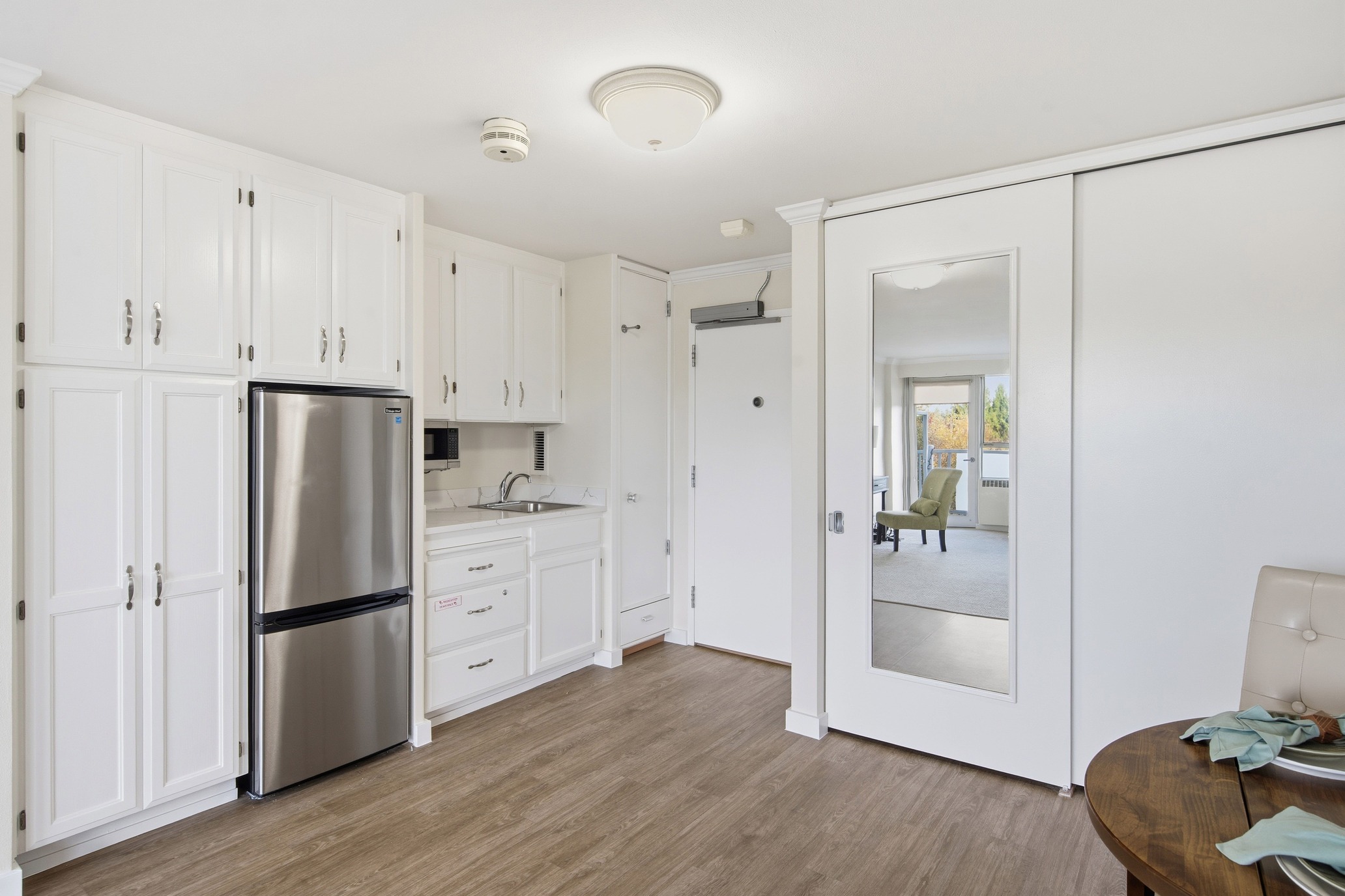 Apartment kitchenette inside a residence at Judson Park, a HumanGood community.