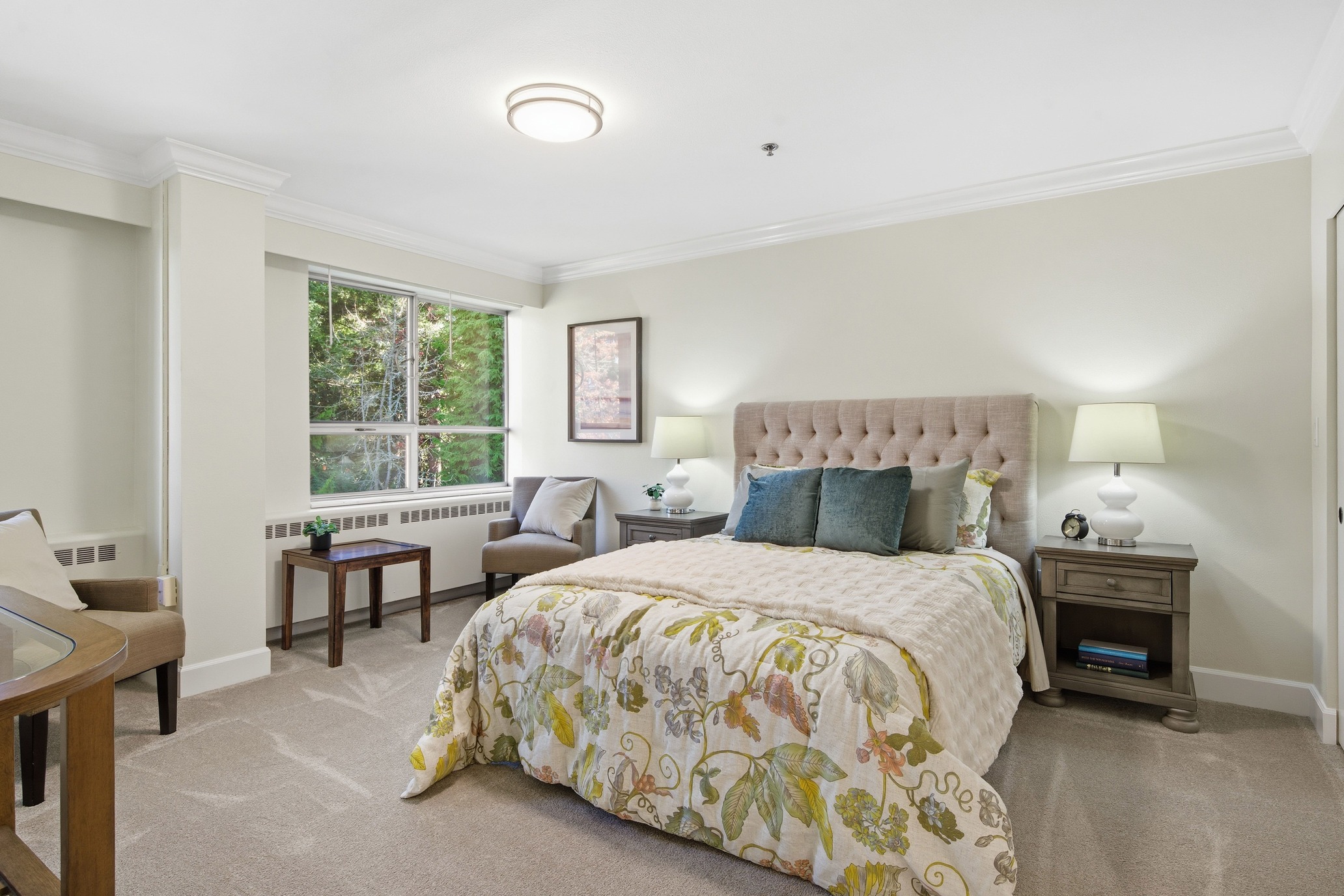 Bedroom inside a residence at Judson Park, a HumanGood community.