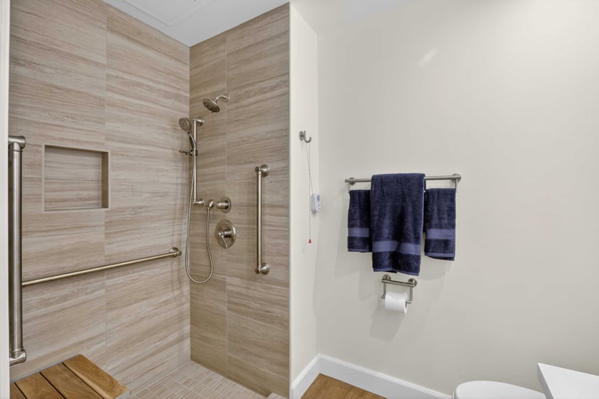 Accessible walk-in shower in an assisted living bathroom at The Terraces of Los Gatos.