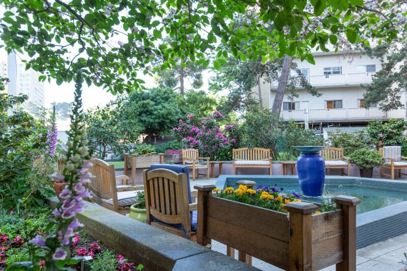 plantings and lots of wood benches