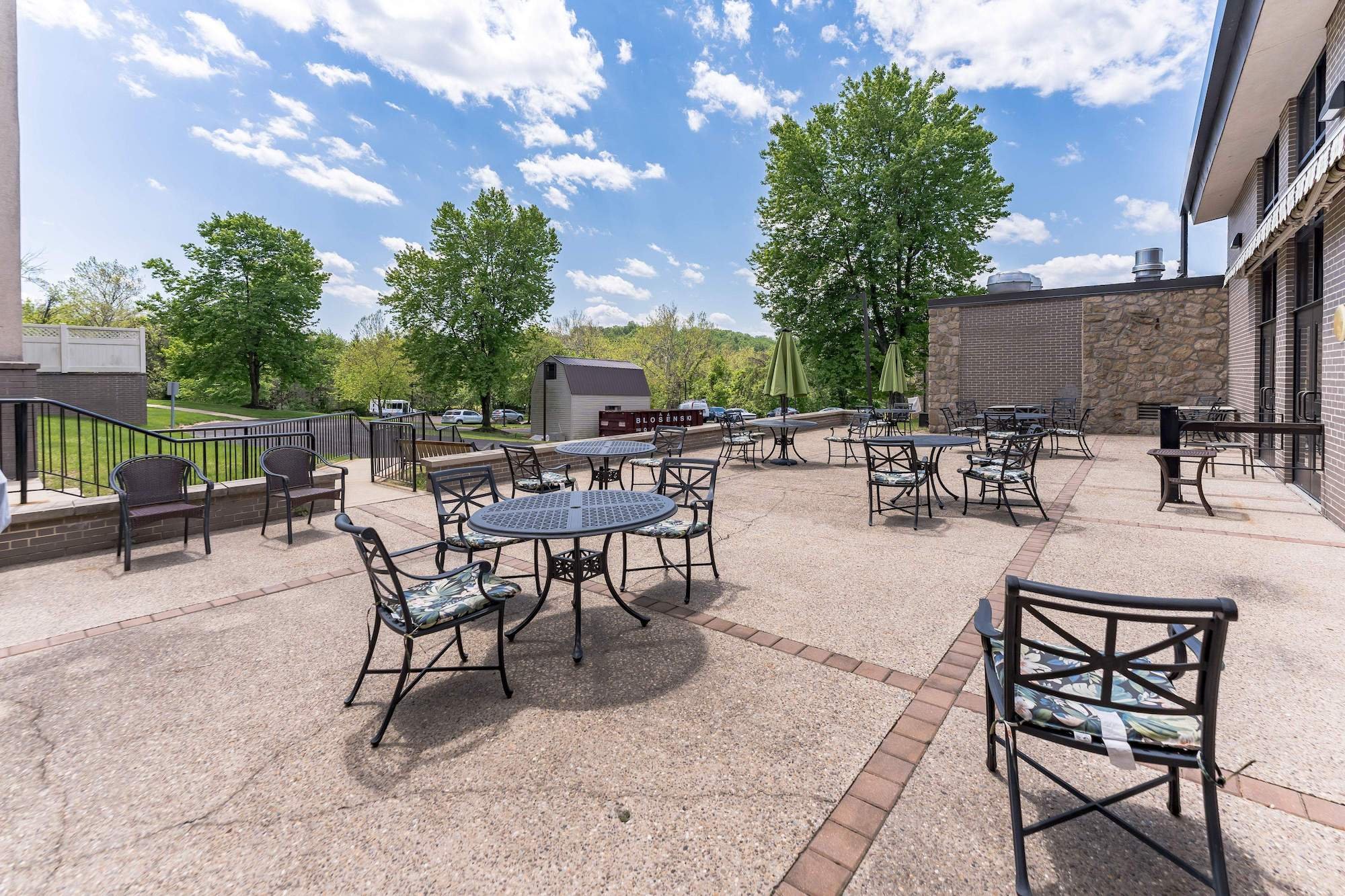 Tables and chairs around patio 