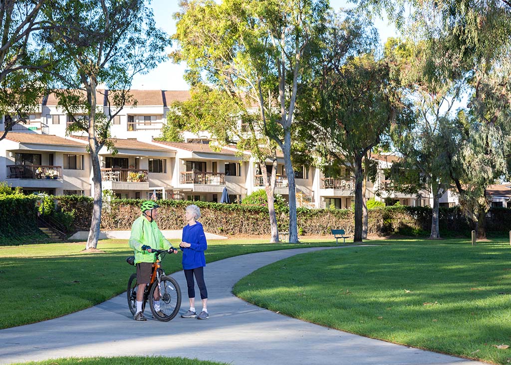 Active seniors on a bike and walking path