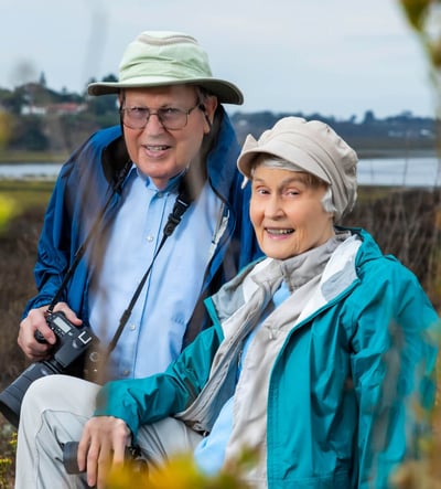 Bryce and Ann smiling while outdoors