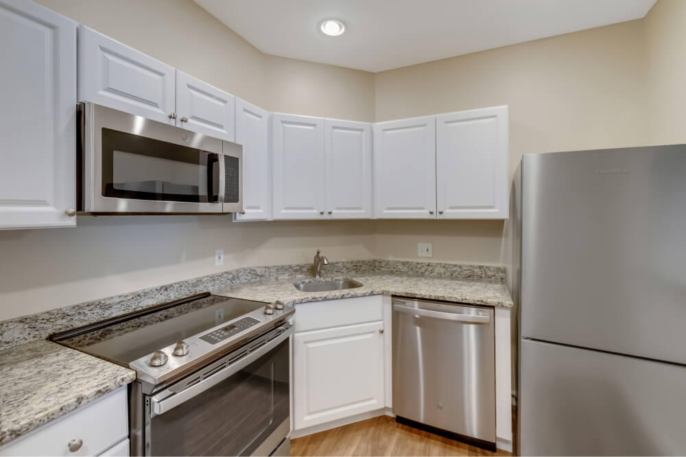 Kitchen of an independent living apartment at Springhouse