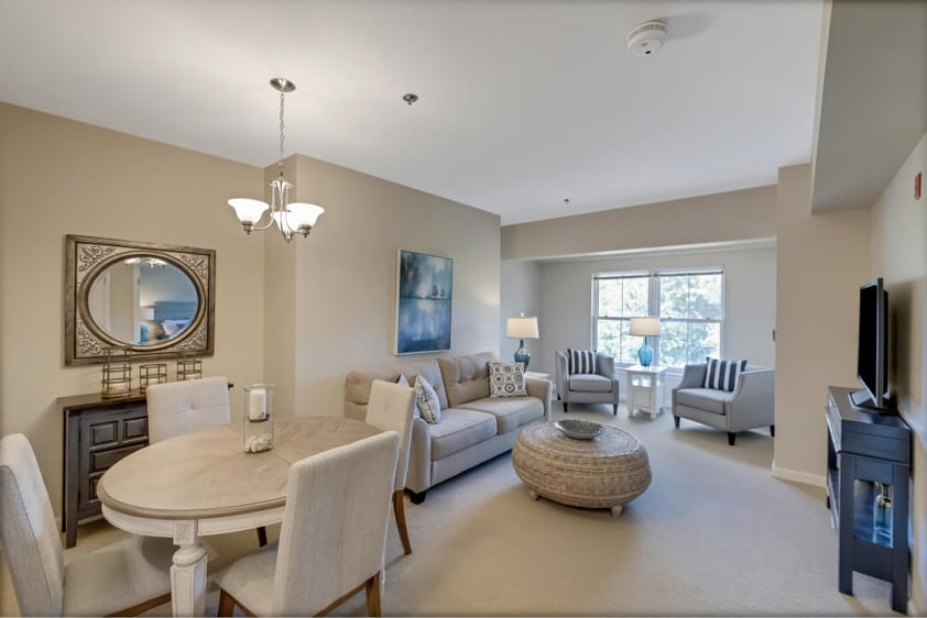 Living room and dining room of an independent living apartment at Springhouse