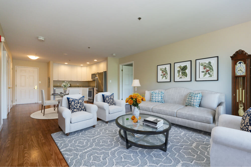 Living room and kitchen of an independent living apartment at Springhouse