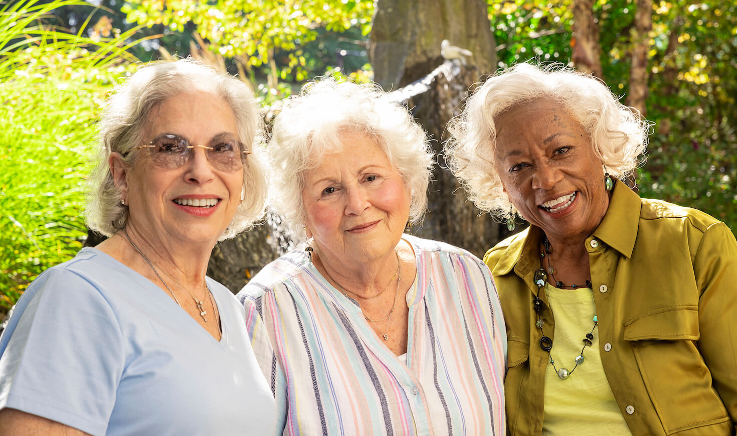 Three smiling senior women 