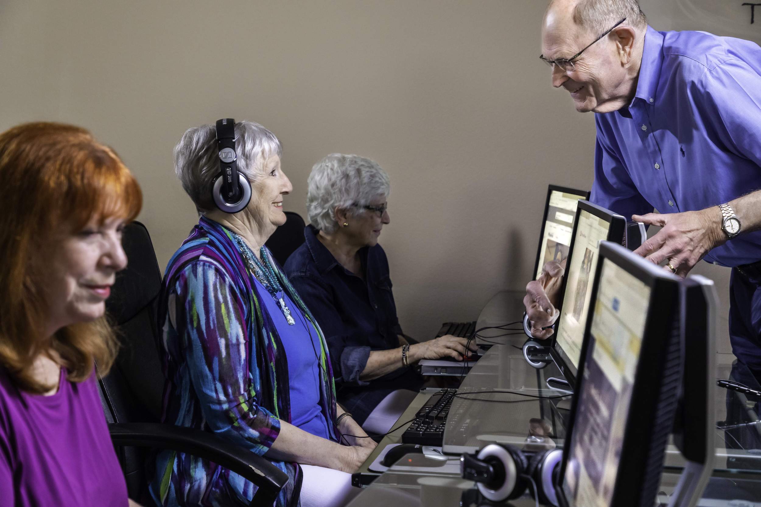 Seniors taking a computer class
