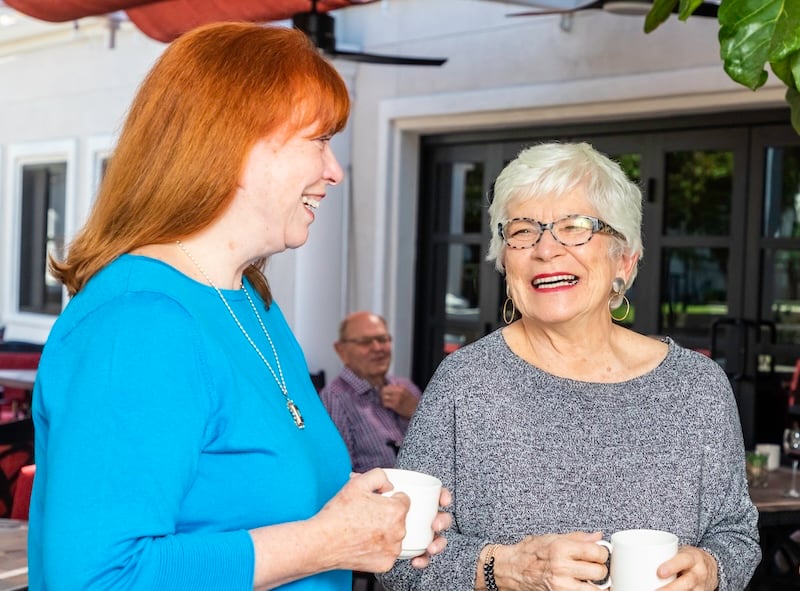 Two senior women chatting with each other