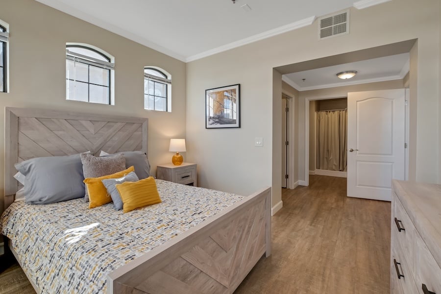 Bed and nightstand in master bedroom