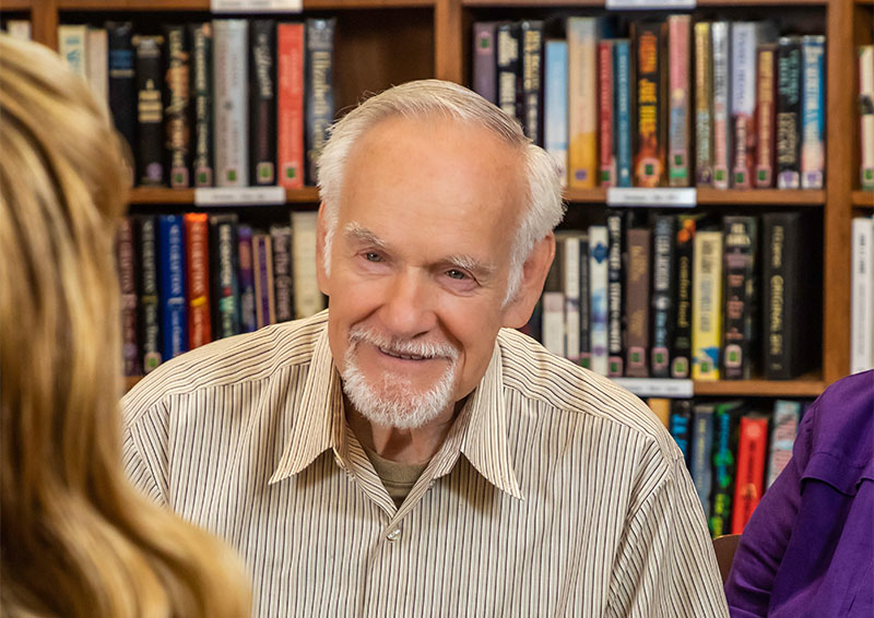 Senior man in a library