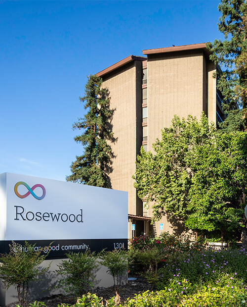 Sign outside Rosewood, a HumanGood Life Plan Community in Bakersfield, California