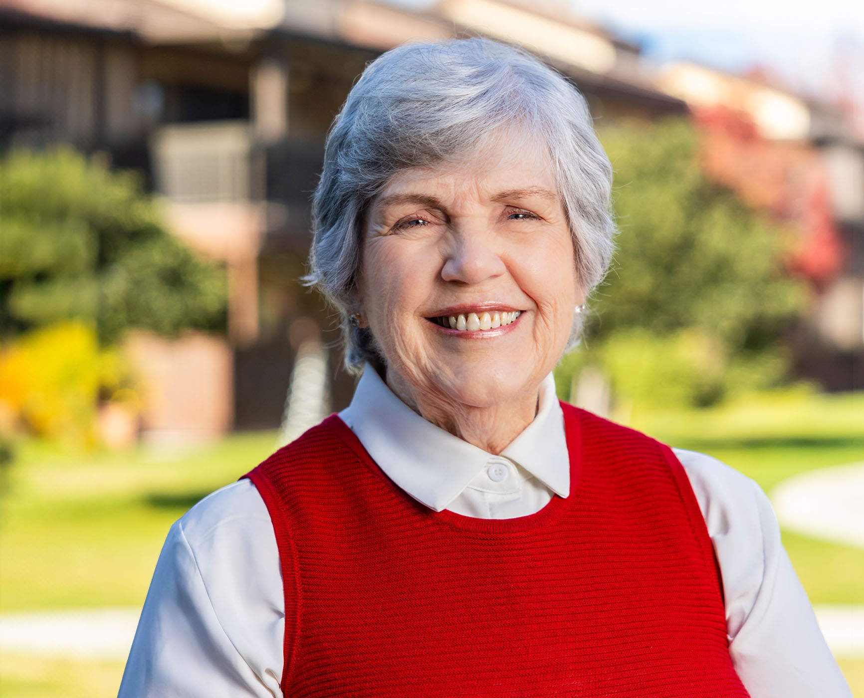  Close-up of smiling senior woman outside