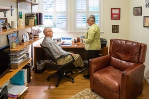 Senior couple in the office of their apartment at Royal Oaks