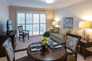 Large living room and dining room of an apartment at Royal Oaks