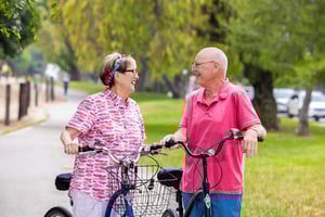 Senior couple riding bikes