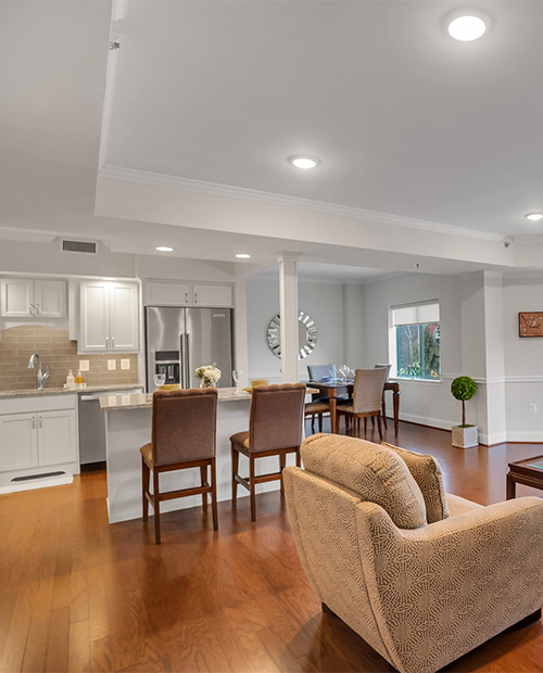 Living room and kitchen of an apartment at Rydal Park & Waters