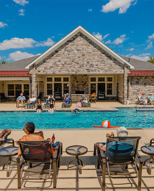 Groups of seniors enjoying a day at the community pool