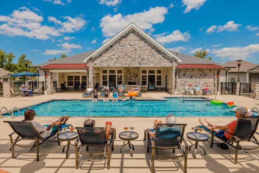 Groups of seniors enjoying a day at the community pool