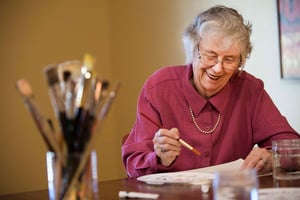 Senior women painting