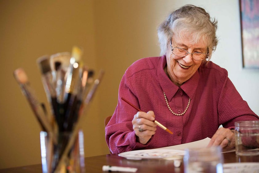 Senior women painting