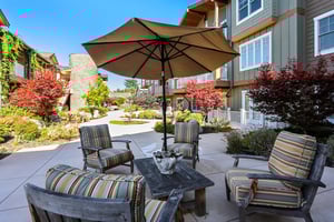 Patio table, chairs and umbrella at The Terraces at Los Altos