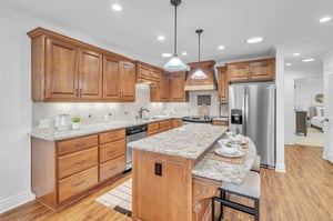 Side view of kitchen island and kitchen area