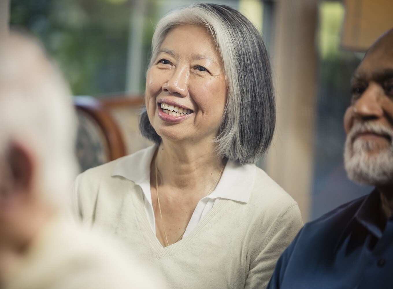 woman smiling during a lecture