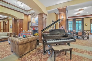 Grand piano in large community room at The Terraces of Boise