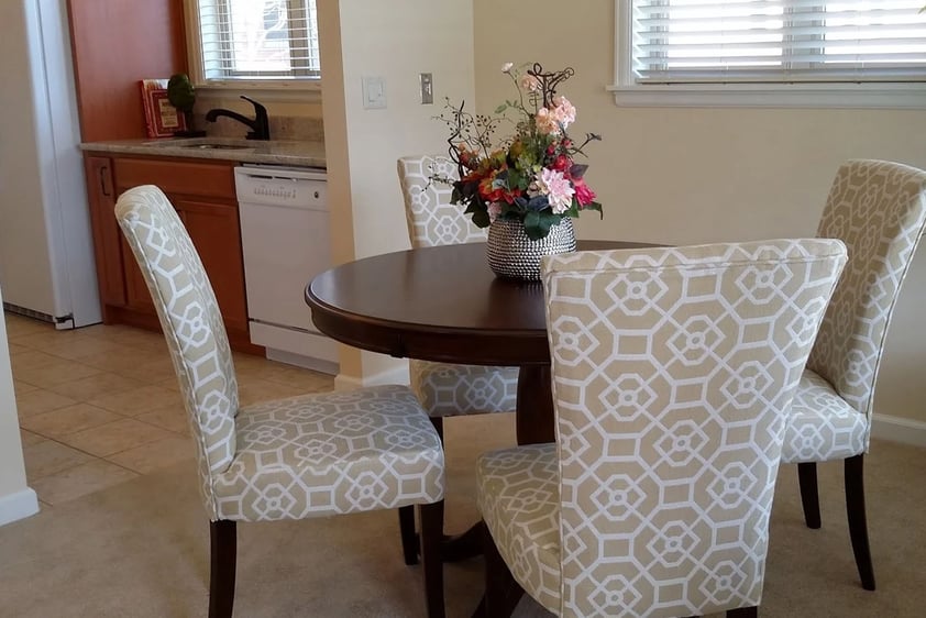 Dining room table and chairs in an apartment at The Terraces of Boise