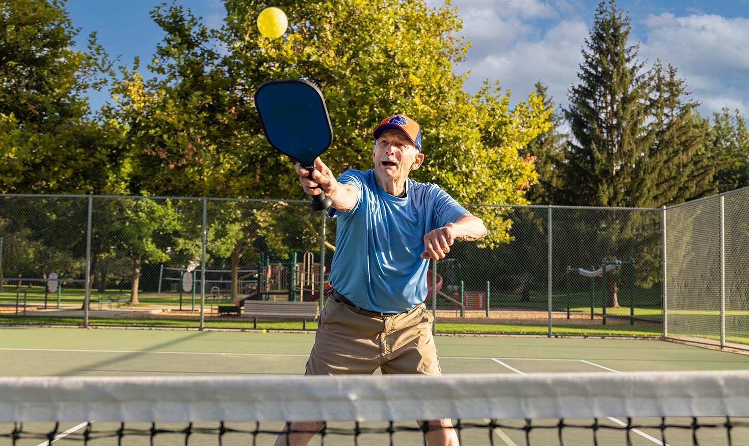 Senior man playing pickleball