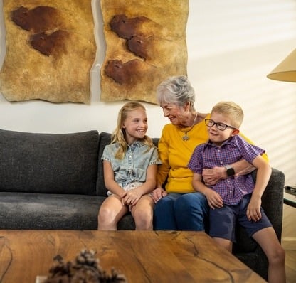 senior woman with her grandkids