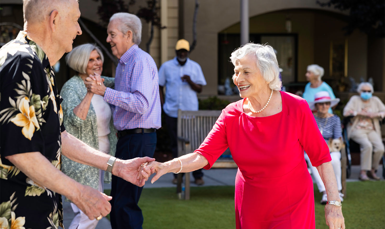 Seniors dancing on the lawn