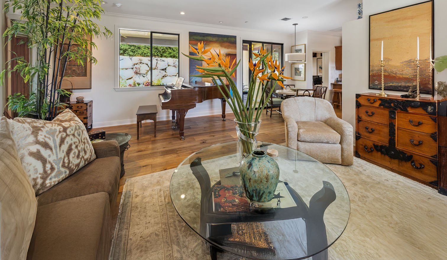 Living room of a garden home at Valle Verde with a grand piano