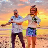 Dan Ogus dancing on the beach