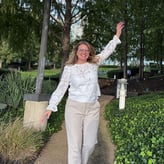 Jennifer Kappen posing in a garden