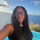 Kendra Roberts on vacation with the ocean in the background