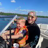 Nick Lindberg on a boat