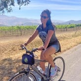 Karmen Hudson riding bike outside