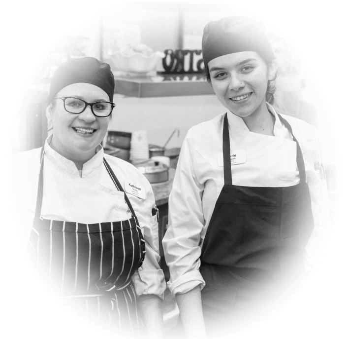 Two dining team members of a HumanGood Life Plan Community