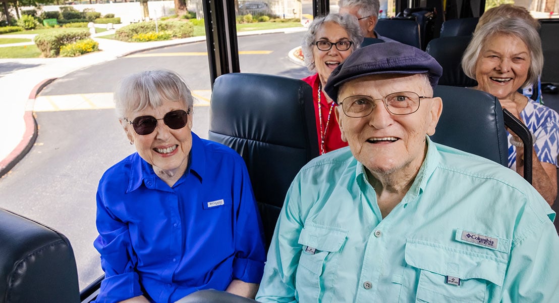 Group of seniors riding in a bus