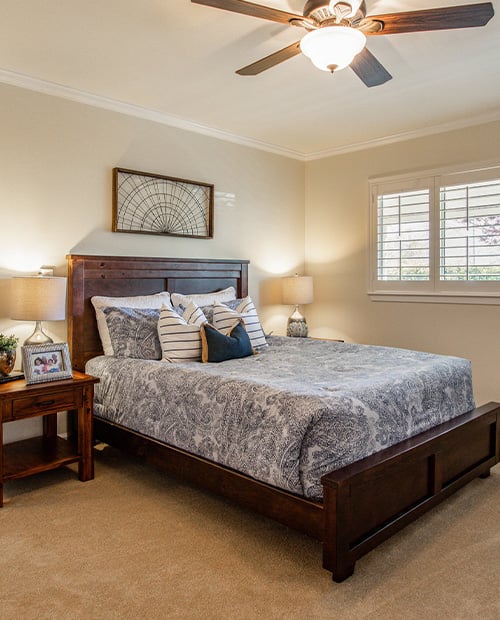 Bedroom of an assisted living suite at Plymouth Village