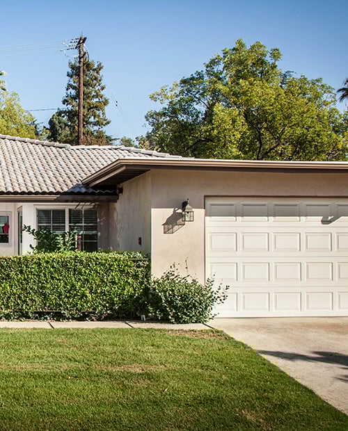 Single-level home with a garage in the Plymouth Village community