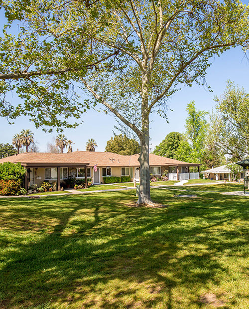 Exterior of a single-level home at Plymouth Village, a HumanGood Life Plan Community in Redlands, California