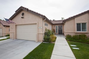 Exterior of a home with garage at Westminster Gardens