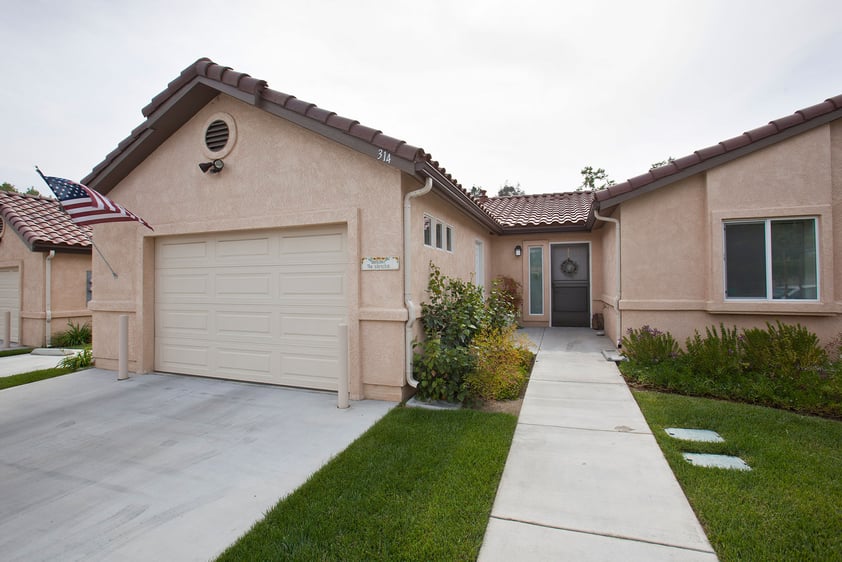 Exterior of a home with garage at Westminster Gardens