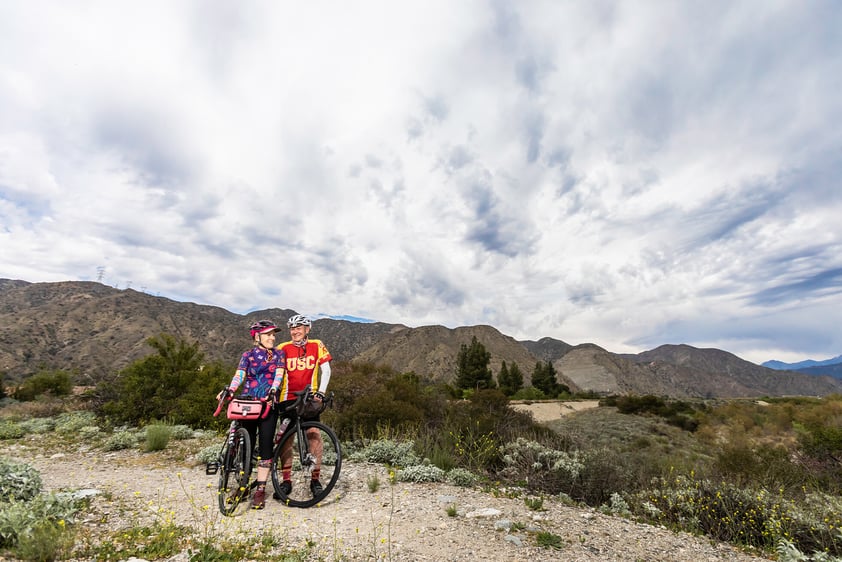 Senior couple on mountain bikes