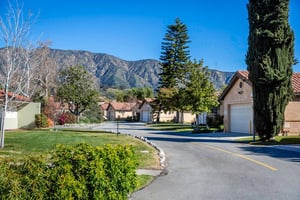 Homes at Westminster Gardens, a Life Plan Community in Duarte, California, with mountains in the background