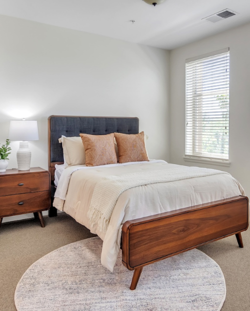 bedroom with cream and white blankets