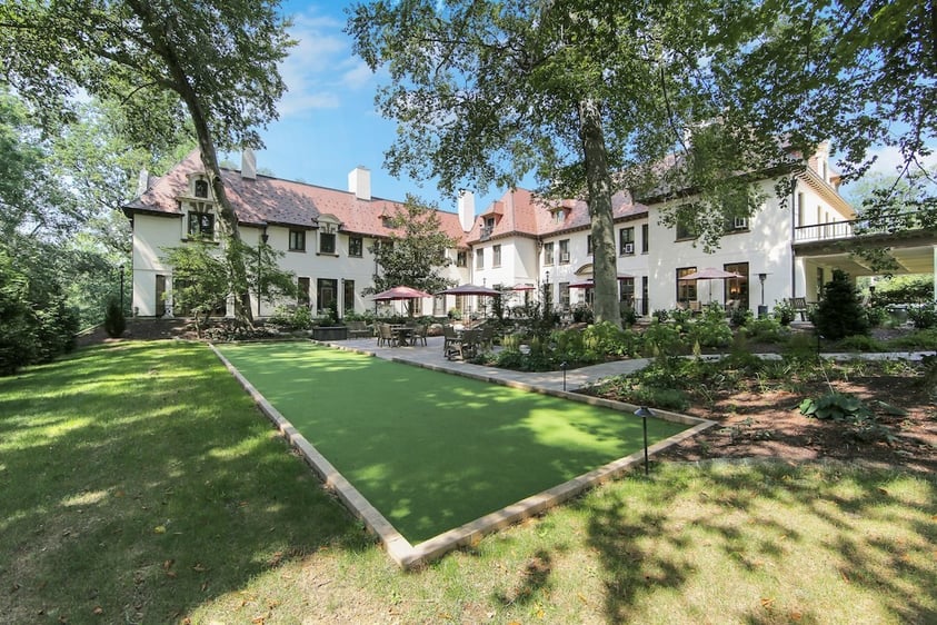 Another view of The Mansion at Rosemont's backyard patio and a putting green